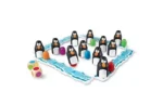 Jeu de société avec pingouins et dés colorés