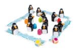 Jeu de société avec pingouins et œufs colorés.