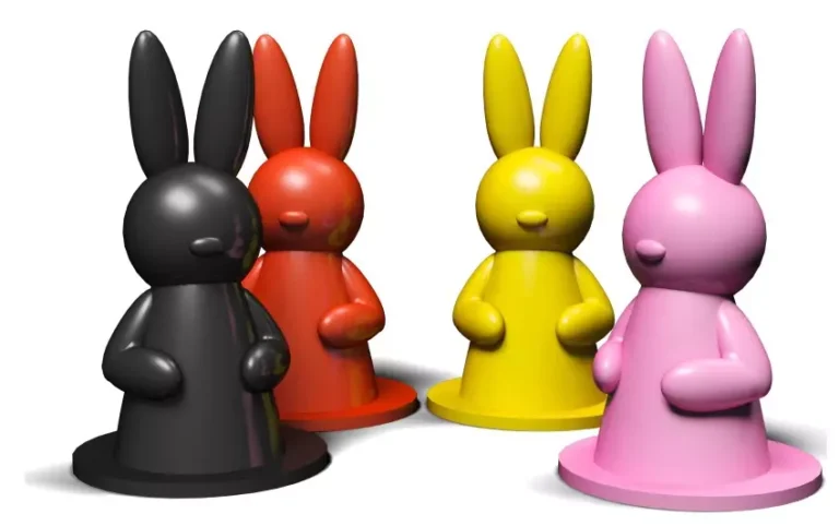 Figurines de lapins colorés noir rouge jaune rose